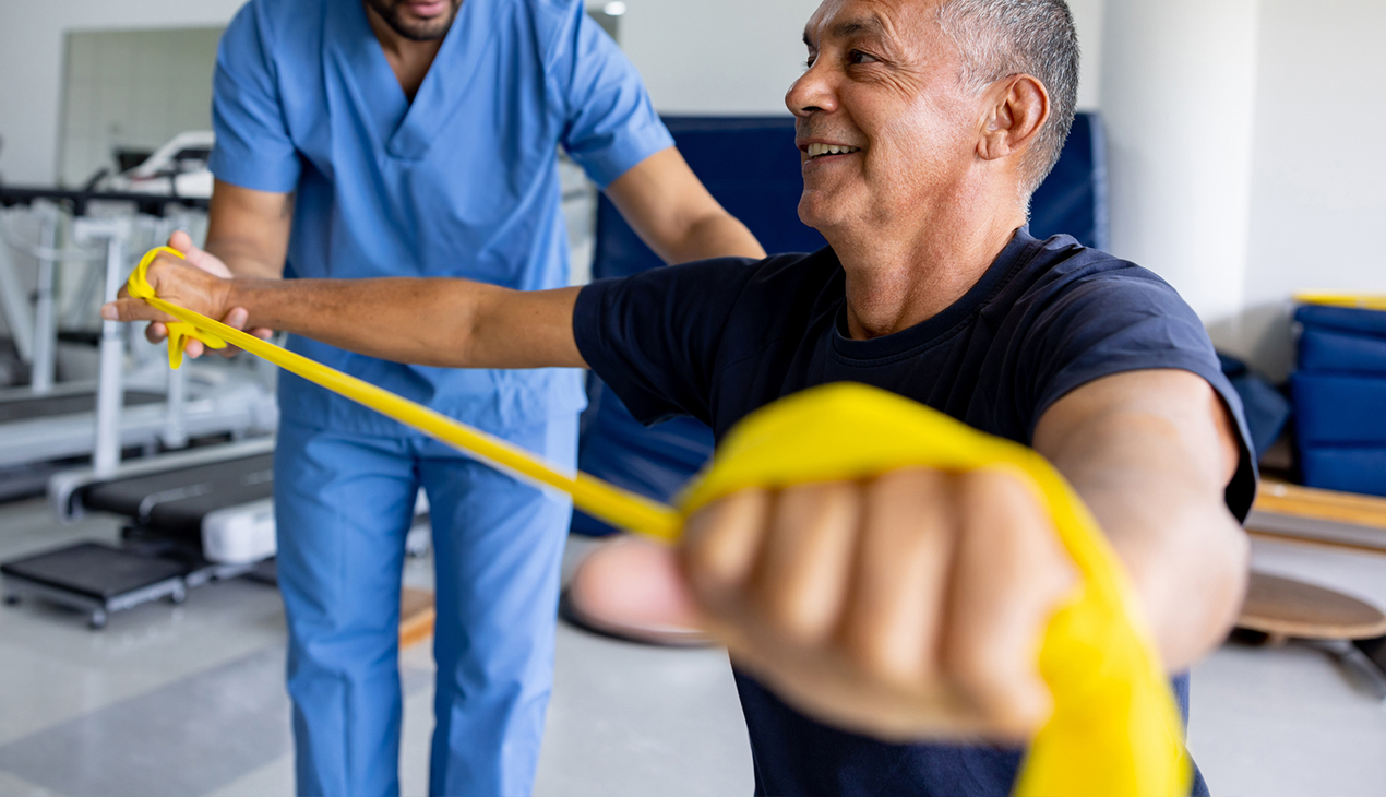 patient using resistance band for therapy