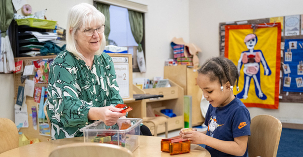 Teacher and student in classroom