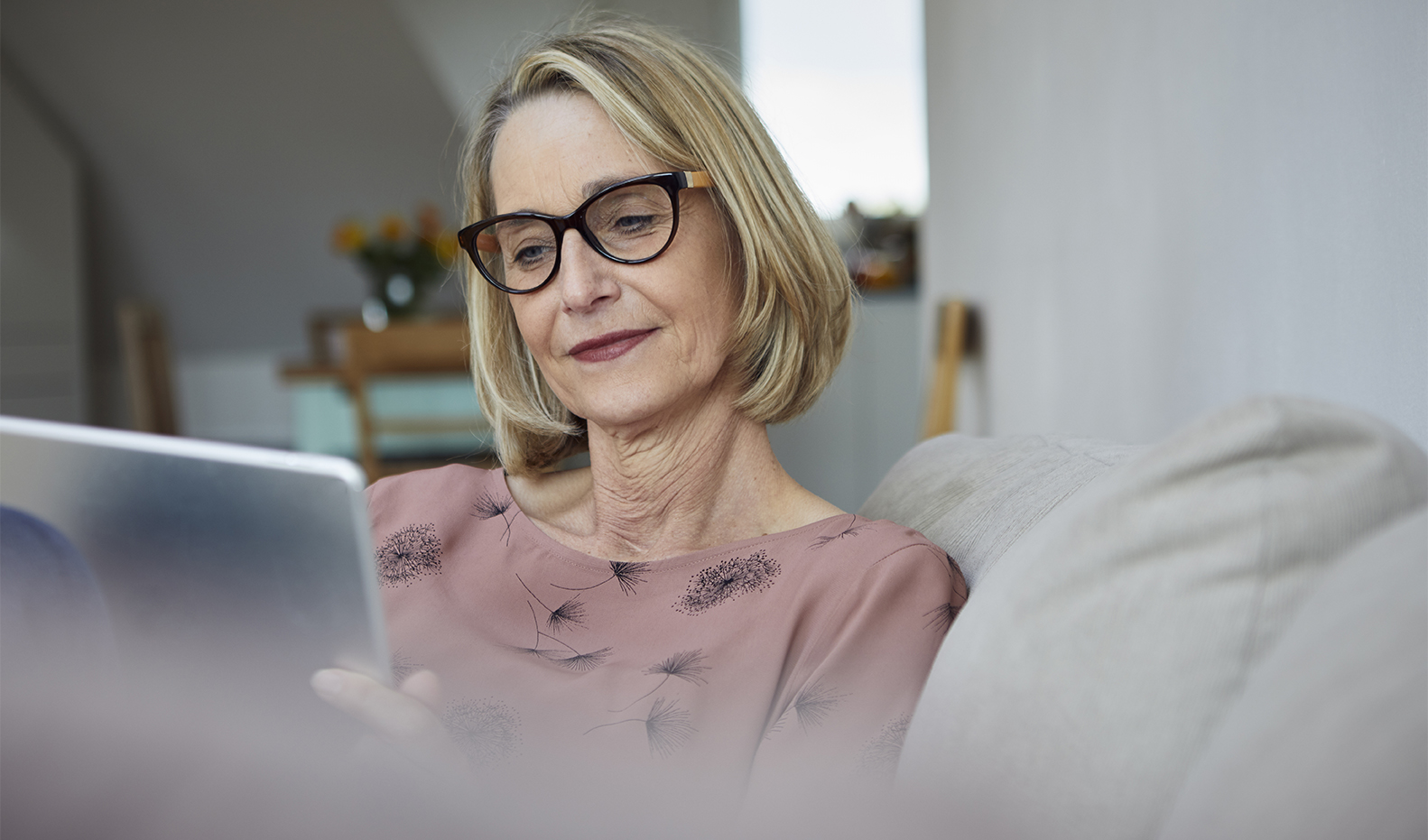 Woman looking at tablet